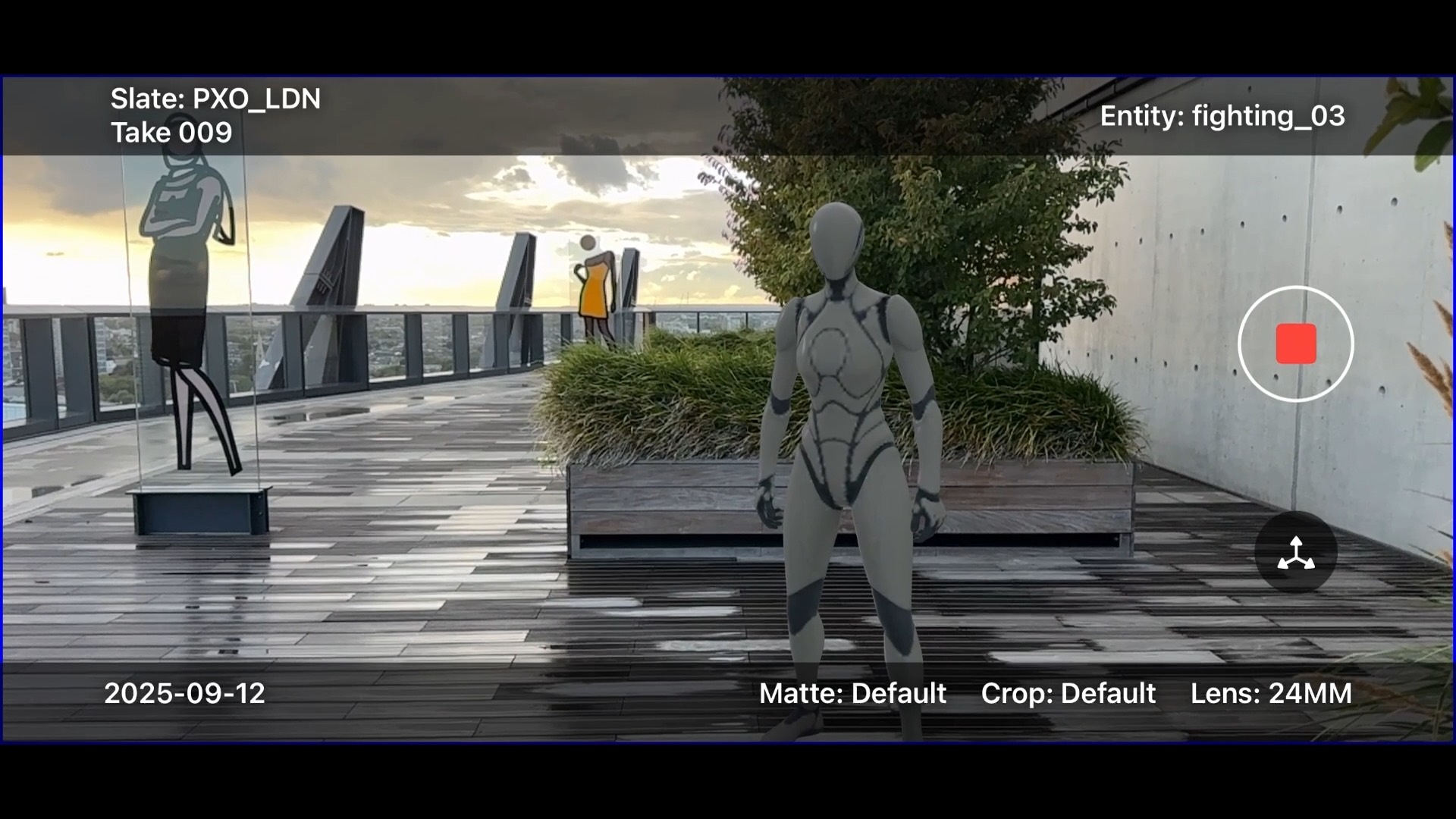 A CG mannequin standing on a rooftop terrace beside planters, people visible further down the walkway